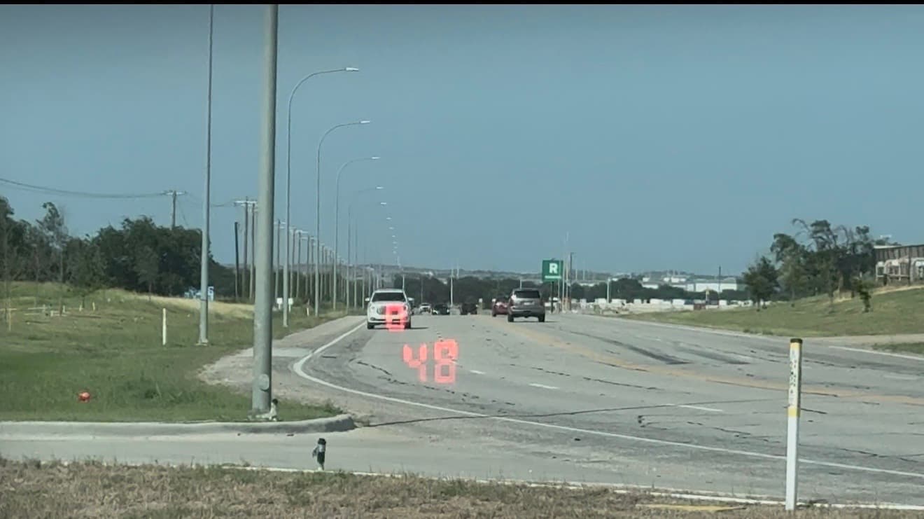 Laser Ally scope view showing a 48 MPH reading